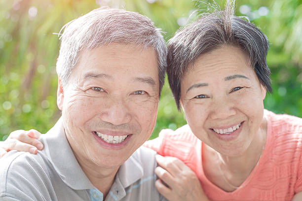 istock old couple smile to you 623426884