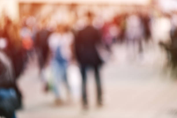 istock Abstract blur crowd of people on street in rush hour 623427234