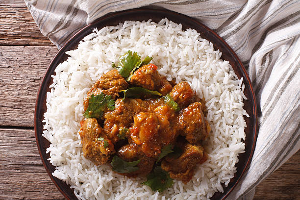 istock Indian Madras beef with basmati rice closeup. Horizontal top view 623428058