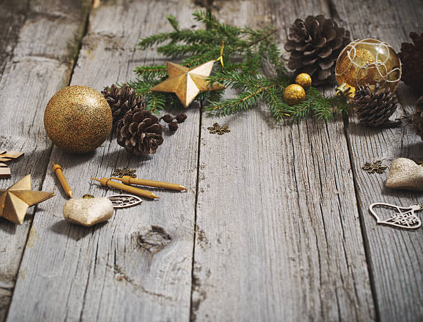 istock Golden decoration on old wooden background 623429234