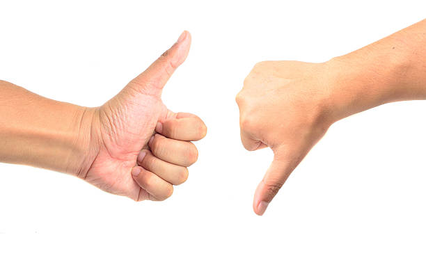 istock Thumb up and thumb down hand signs 623431708