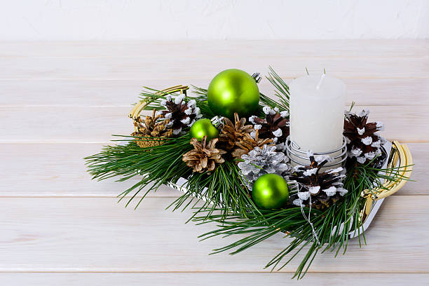 istock Christmas green ornaments, snowy and silver pinecones 623431744