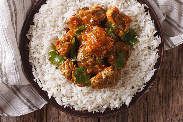 istock beef madras with basmati rice close-up on a plate. horizontal 623432390