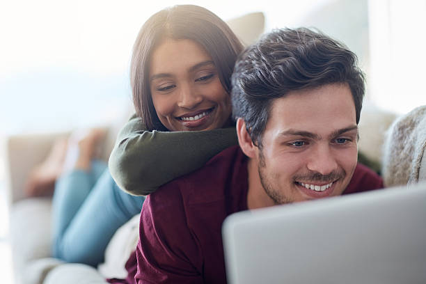 istock She loves watching him blog 623434794