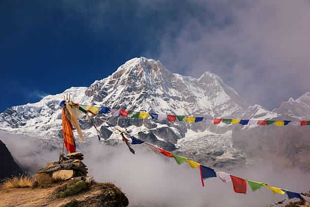 istock Annapurna I (8,091m) with prayer flag 623435288