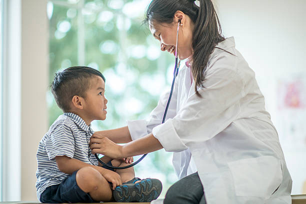 istock Cute Little Boy at the Doctor's Office 623436892