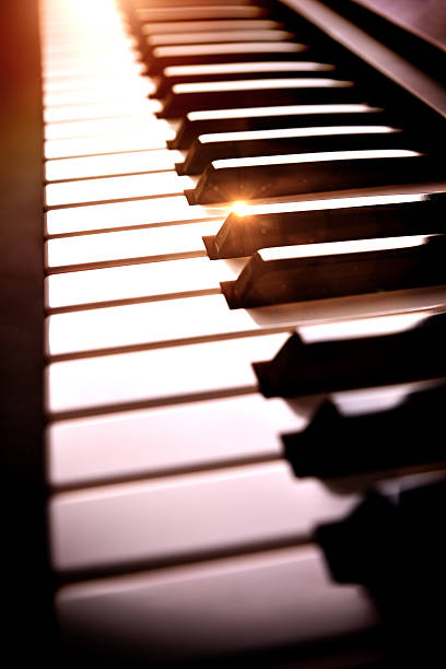 istock Electronic piano keyboard in the shade with shine elevated view 623436952