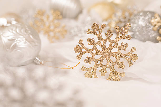 istock Gold Christmas snowflake ornament on white background. 623437088