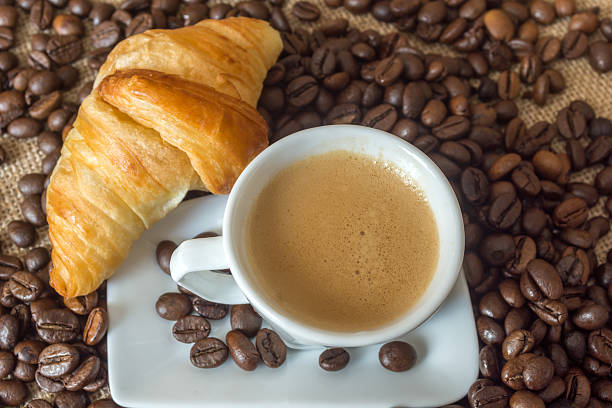 istock Cup and grain of coffee 623437136