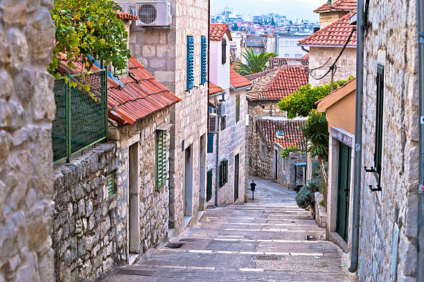 Old stone street of Split historic city Old stone street of Split historic city, Dalmatia, Croatia split croatia stock pictures, royalty-free photos & images