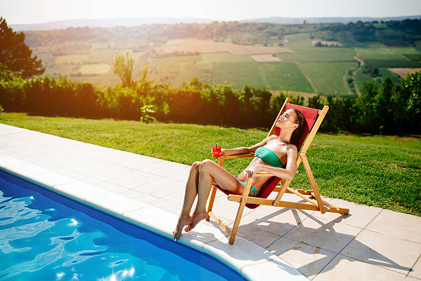 istock Beautiful woman sunbathing with joy 623441316