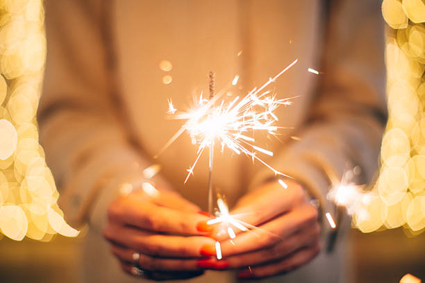 Woman holding sparkler