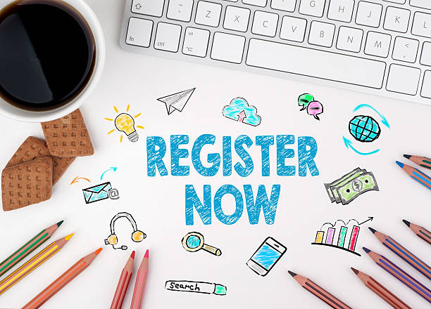 istock Register Now, Business concept. White office desk 623445176