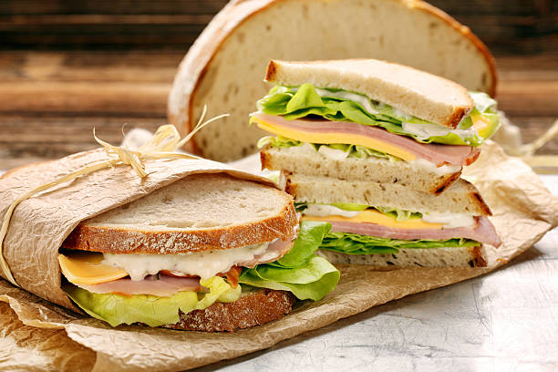 istock Fresh sandwich with ham cheese and lettuce 623445408