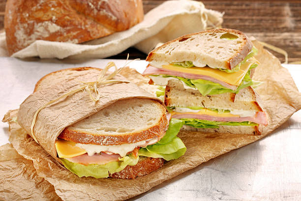istock Fresh sandwich with ham cheese and lettuce 623445556