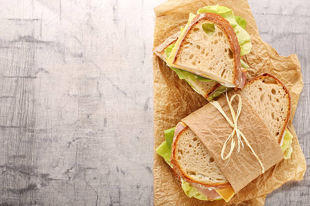 istock Fresh sandwich with ham cheese and lettuce 623445732