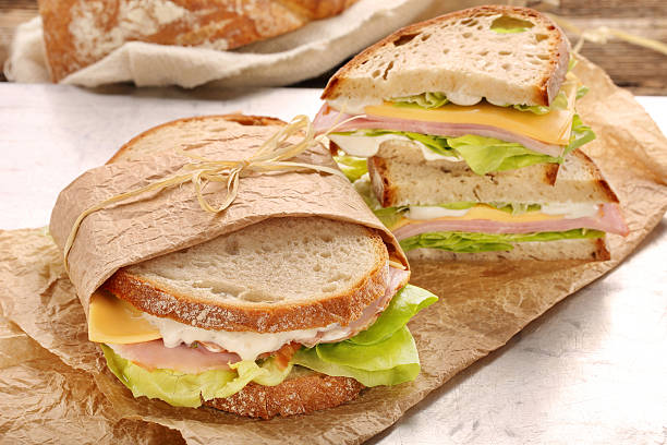 istock Fresh sandwich with ham cheese and lettuce 623445840
