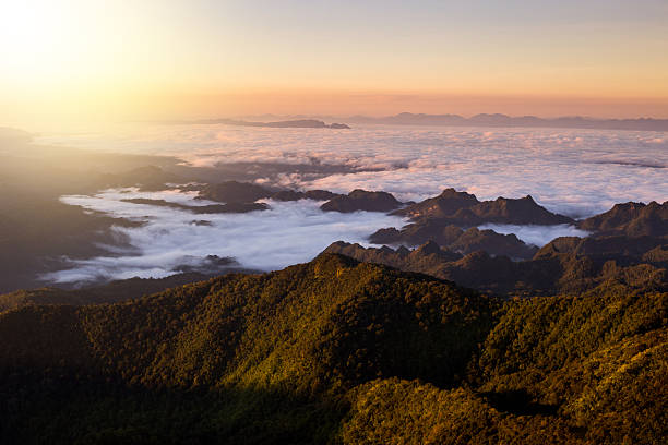 istock beautiful sun rise on top mountain with could 623447612