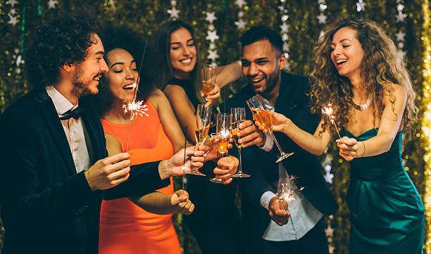 New Year's Eve Toast Happy friends celebrating the New Year. new years eve parties stock pictures, royalty-free photos & images