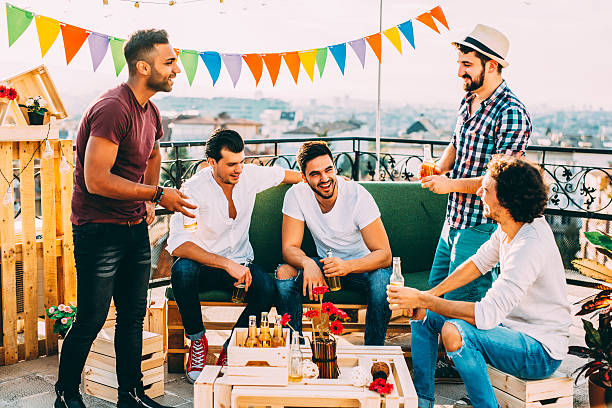 istock Friends having a party on the roof 623448598