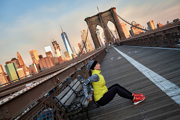 istock Female athlete exercising on the bridge 623449756