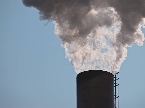 istock Close up of a smoking chinmney 623452604