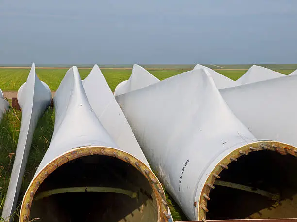 wind turbine blades awaiting assembly