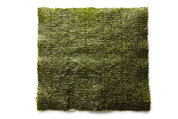 Asian Food: Nori Sheet Isolated on White Background http://www.stefstef.nl/banners2/asianingredient.jpg nori stock pictures, royalty-free photos & images