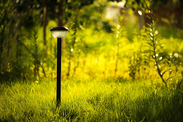 istock Plastic garden flashlight standing on the ground in the garden 623454306