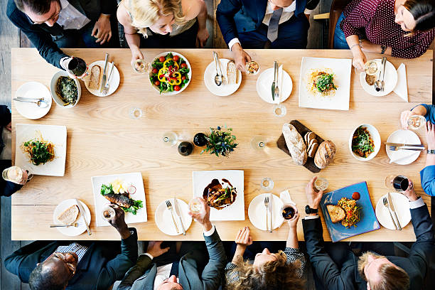 istock Business Meeting Eating Cheers Happiness Concept 623454440