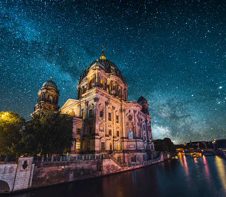 Berlin's cathedral at night under a starry sky