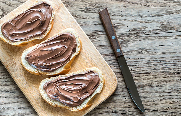 istock Slices of baguette with chocolate cream 623484054