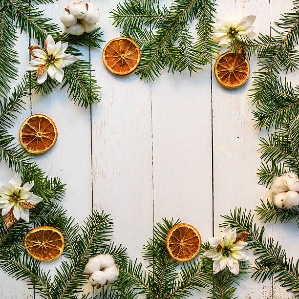 istock Christmas wooden background with fir tree and decoration 623484970
