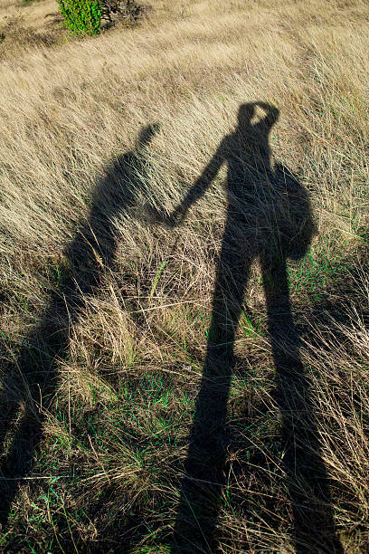 istock Shadow men and women on the steppe 623486994