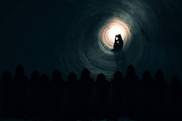 istock Woman Praying While Dark Souls Watch 623488354