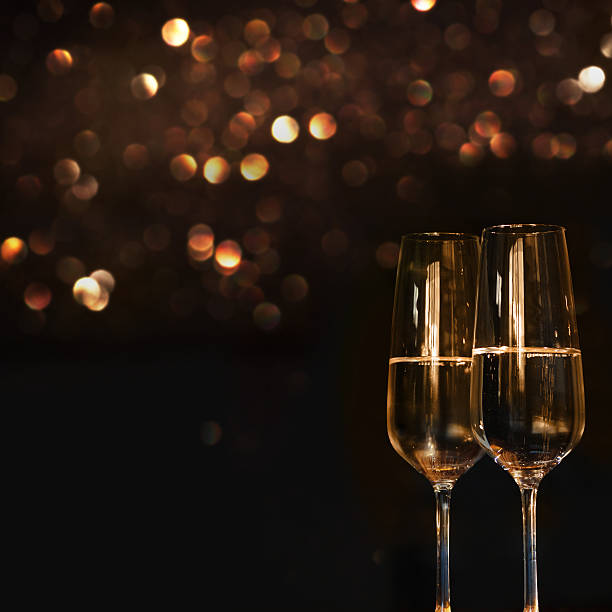 two champagne glasses for festive occasions - textraum imagens e fotografias de stock