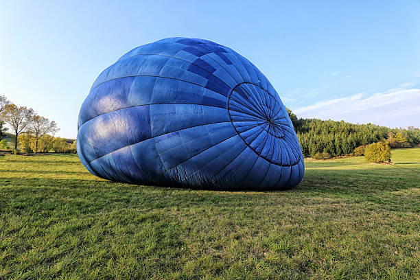 istock Big blue hot air balloon inflated 623496996