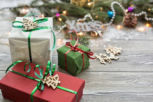 istock Christmas wooden background with fir branches 623497378