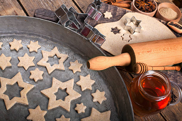 istock Making Christmas Cookies with traditional gingerbread cookies ingredients 623497790