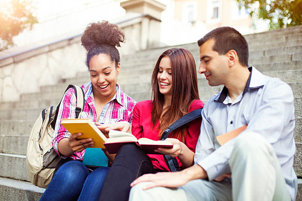 istock Students outdoor with books 623499046