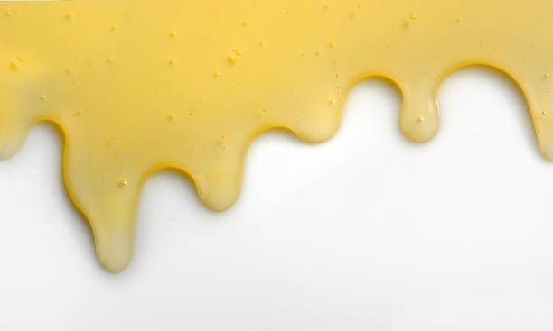 istock Honey liqiud flowing down 623501066