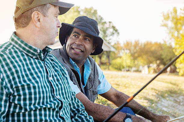 istock Friends have a conversation while fishing 623502554