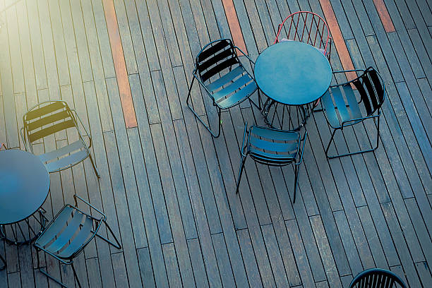 istock Coffee shop tables outdoors from above 623504398