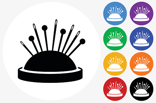 Pin Cushion Icon on Flat Color Circle Buttons. This 100% royalty free vector illustration features the main icon pictured in black inside a white circle. The alternative color options in blue, green, yellow, red, purple, indigo, orange and black are on the right of the icon and are arranged in two vertical columns.