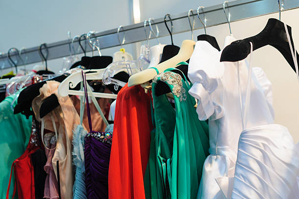 istock womans dresses on hangers in store 623508264