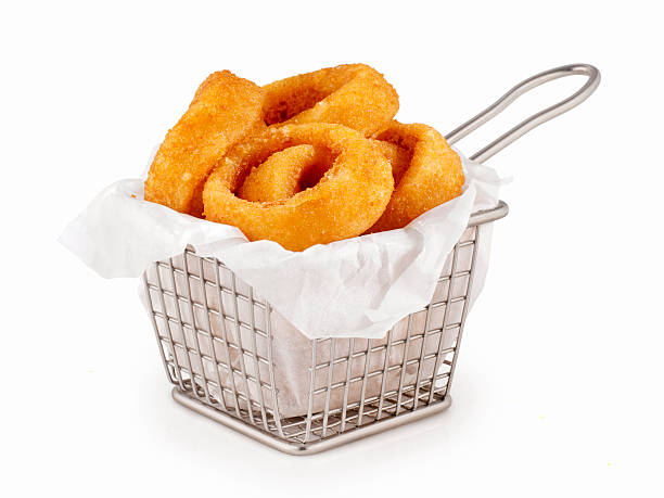 Southern fried and roast chicken bites, onion rings and mozzarella stick served on the white plate, buffet