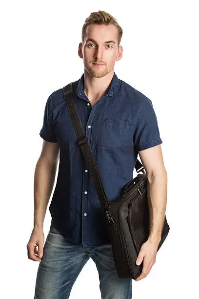Photo of Attractive student with bag looking at camera