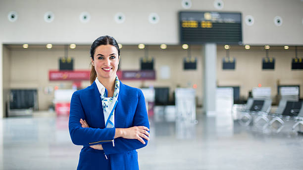 Airline stewardess in airport lounge