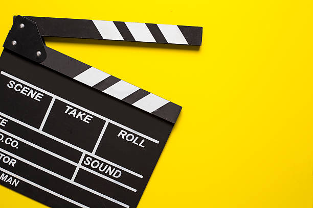 istock movie clapper on yellow background 623510418