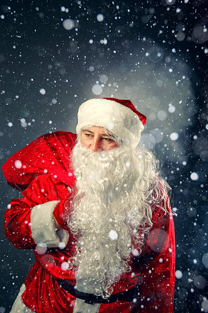 istock Santa Claus carries gifts. 623511220